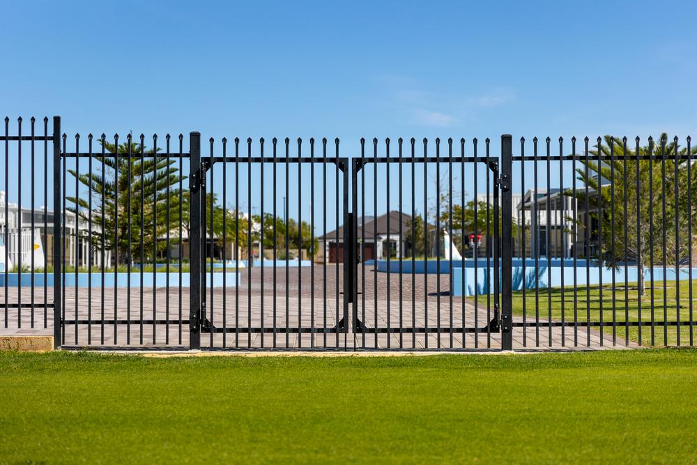 Black Garrison fencing along a school boundary